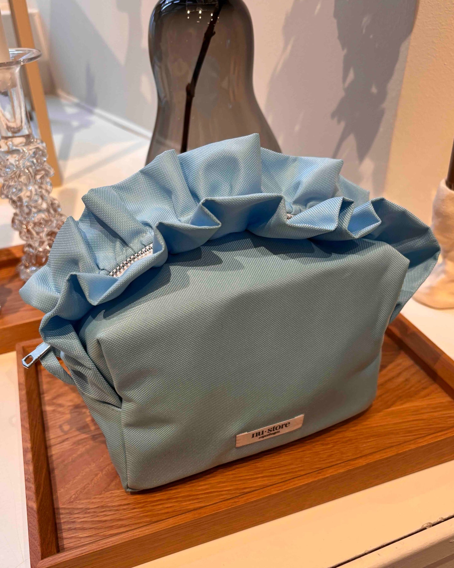 Lys blå beauty bag