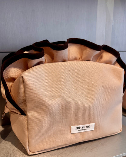 Beige beauty bag med brun kant