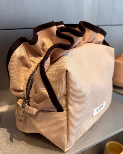 Beige beauty bag med brun kant