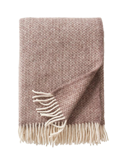 Beige lamb's wool throw