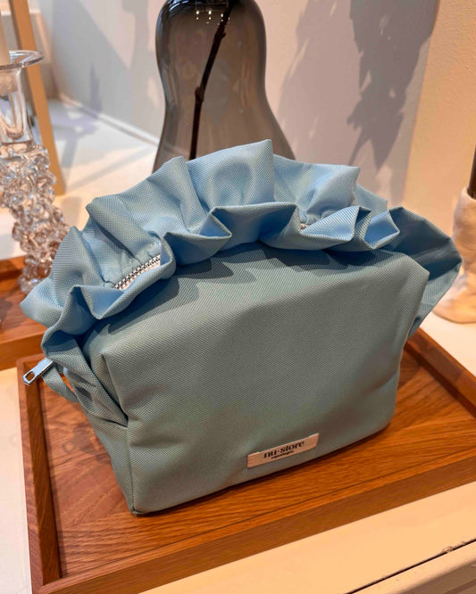 Lys blå beauty bag