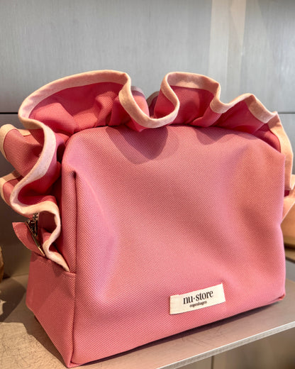 Pink beauty bag med lyserød kant