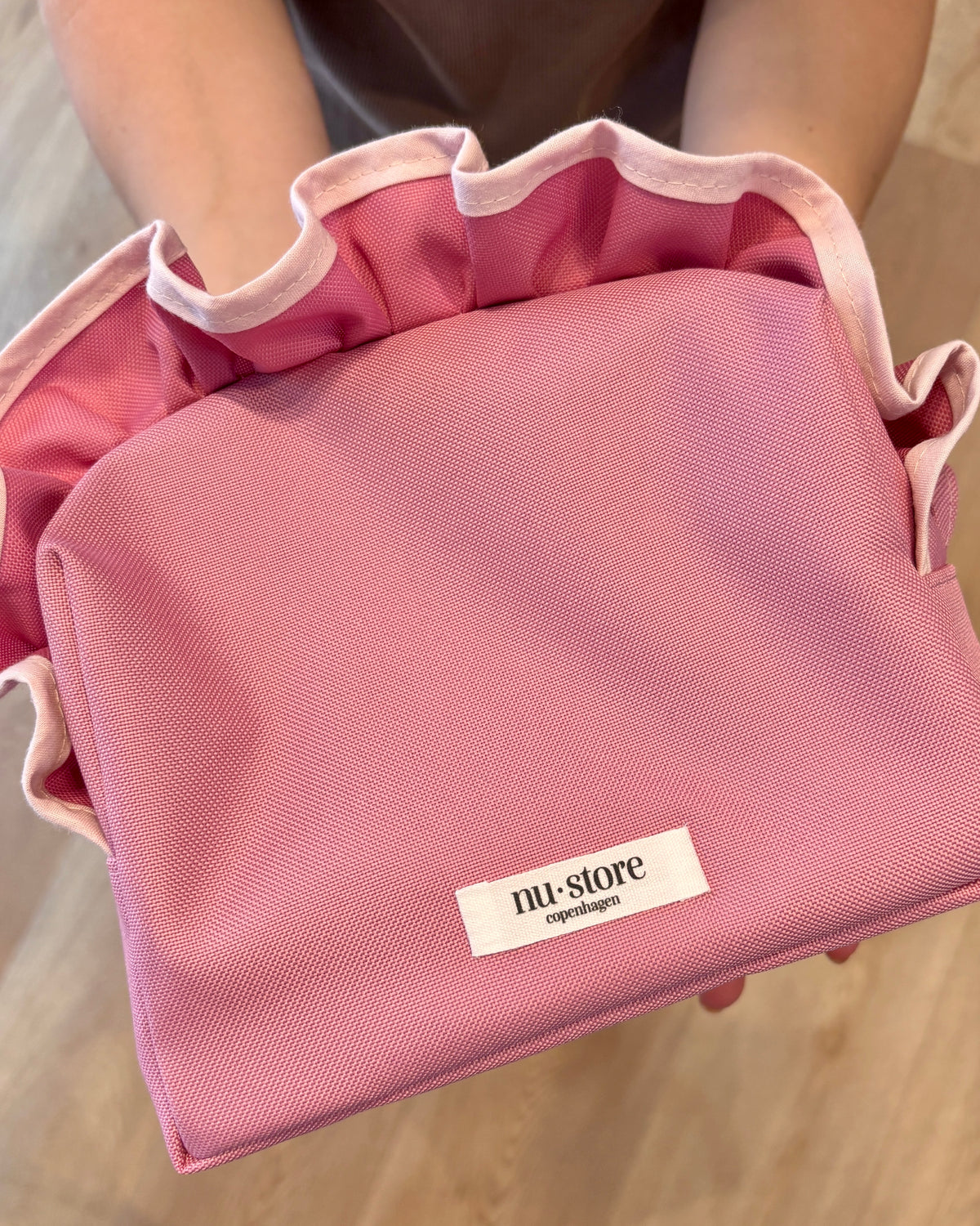 Pink beauty bag med lyserød kant